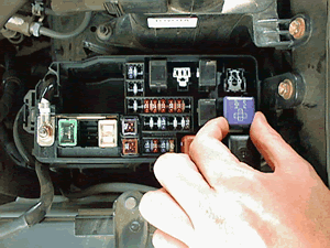 Locate starter relay and remove